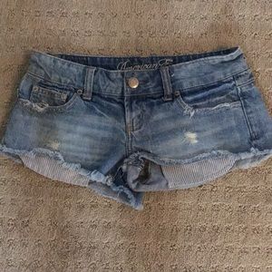 🦅 AMERICAN EAGLE distressed short shorts, size 0